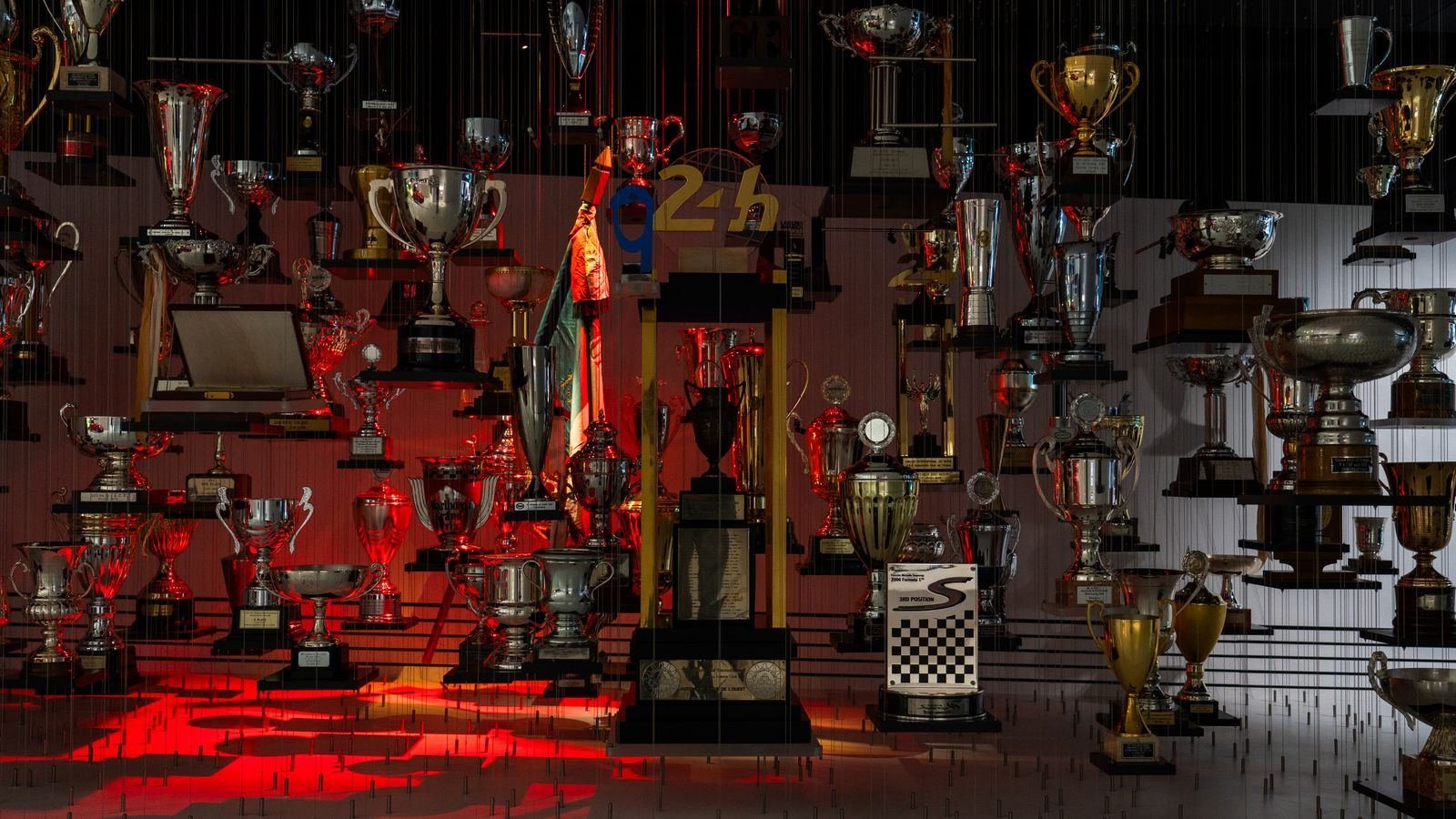 A showroom wall filled with a wide range of trophies